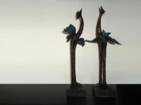 gedenk beelden paradijs vogels brons