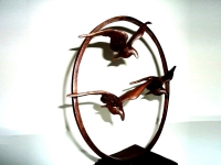 bronzen asbeeld vogels in vlucht
